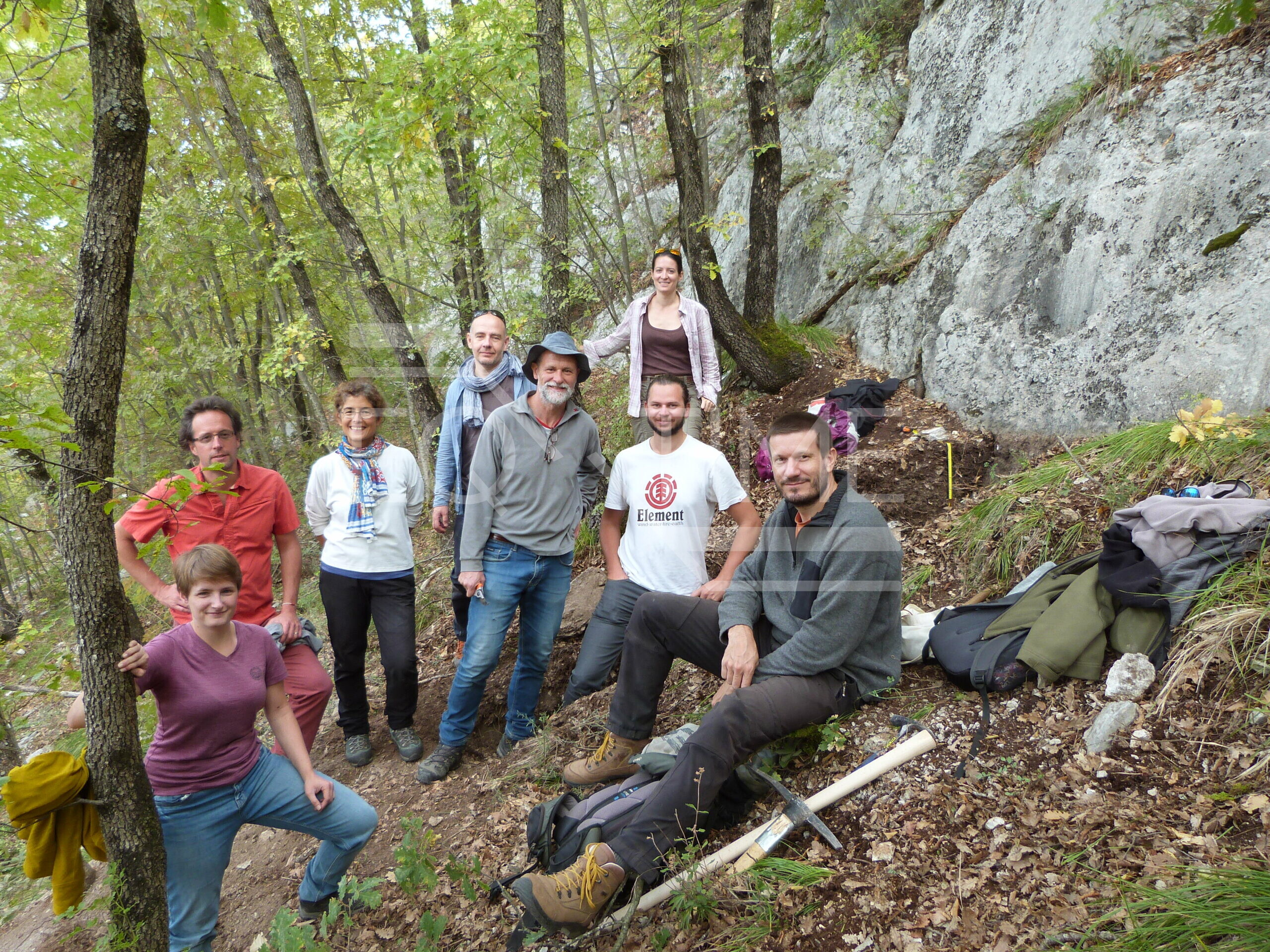 French team standing next to a paleoseismic trench (2021)